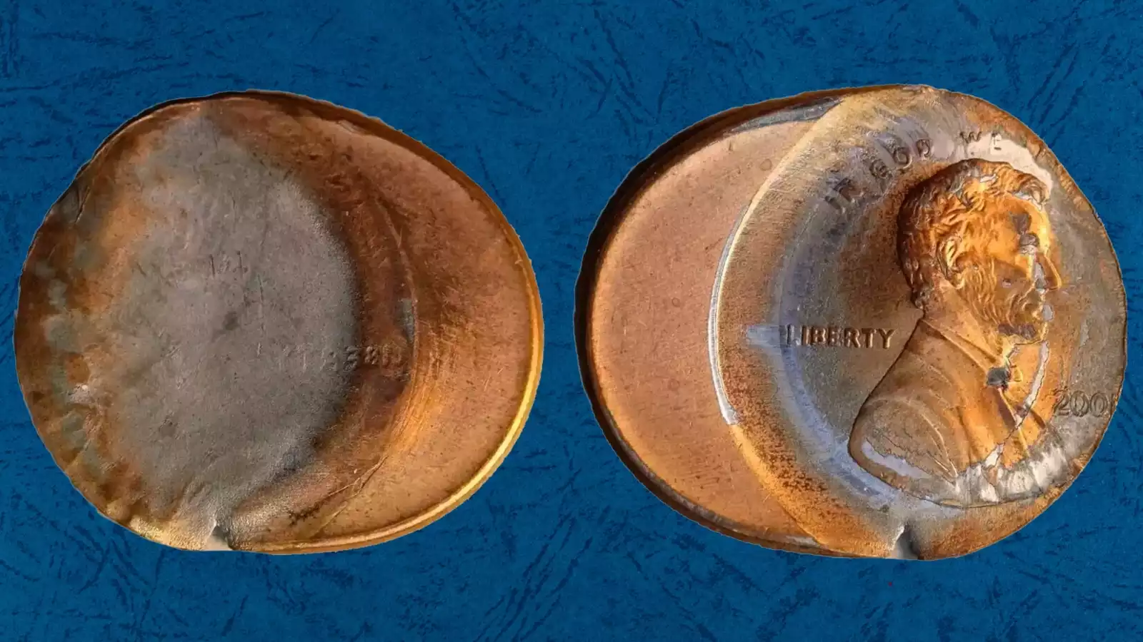 2001 penny with dramatic off-center strike error showing partial design and blank crescent area with full date visible
